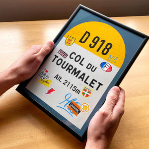 Col du Tourmalet personalised poster, french climbs road sign, man holding framed print