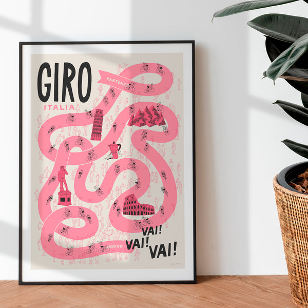 Framed poster with pink cycling route design and 'GIRO' text on a white wall.