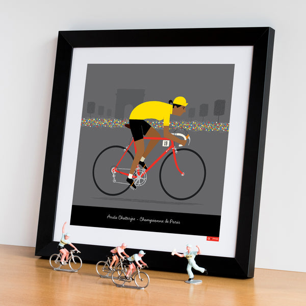 'Female Yellow Jersey Personalised Cycling Print', with tan skin tone option. Size 30 x 30 cm shown in a black frame