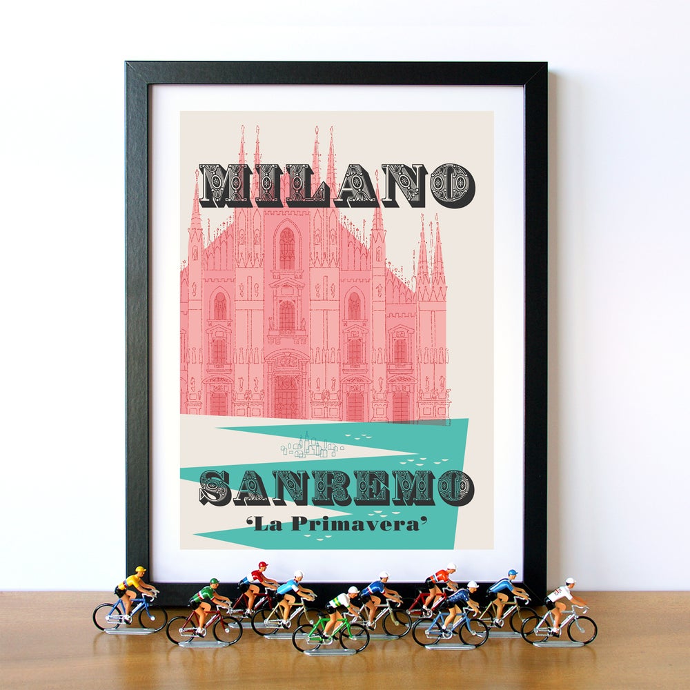 Milan-Sanremo cycling print in black frame, displayed with vintage die cast cycling figures