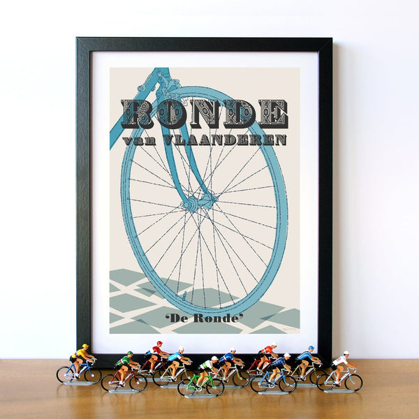 Tour of Flanders cycling print, shown in a black frame and displayed with vintage die cast cycling figures